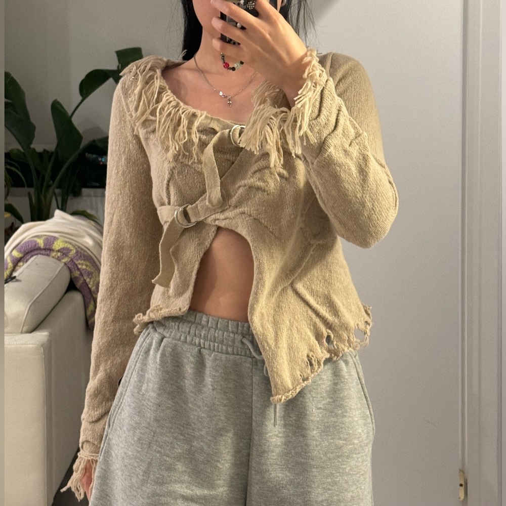 Beige distressed sweater cardigan with buckle
